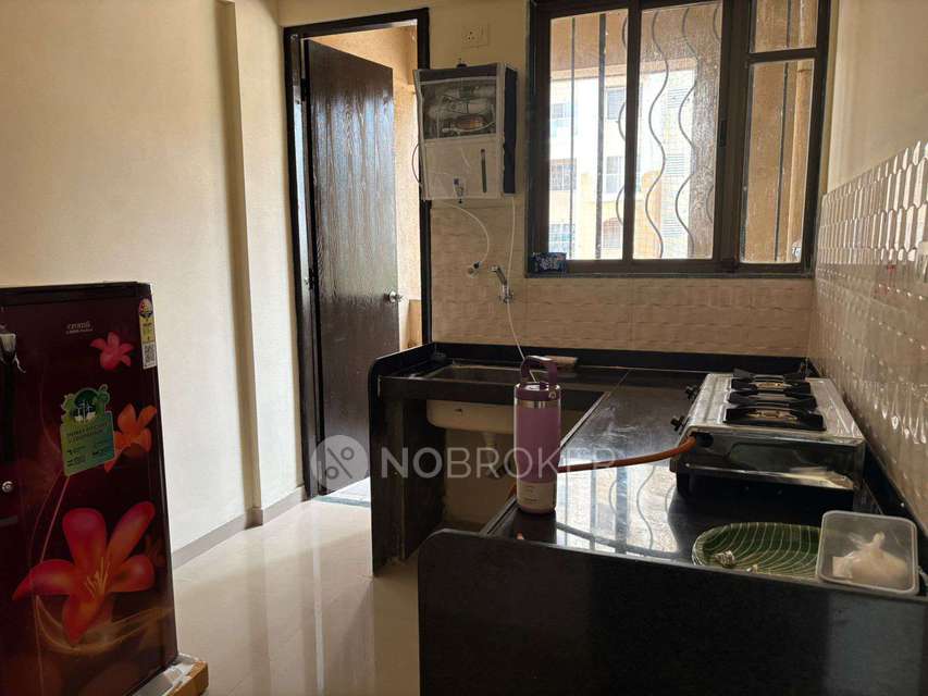 Shared Room for Female In 2 BHK  In  Apartment In Mahalunge