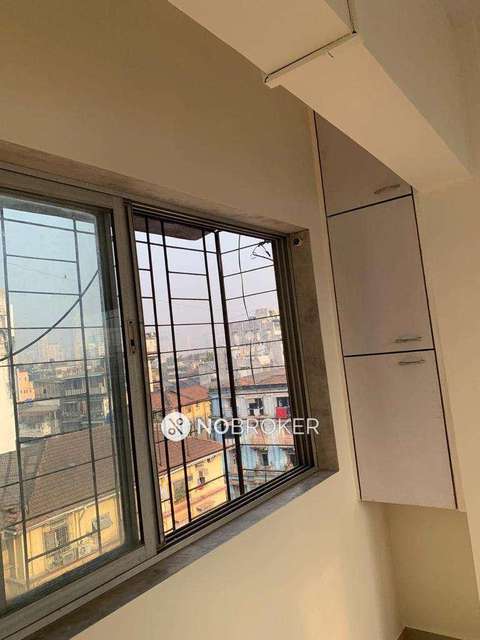 1 RK Flat In Mago Param Tower For Sale  In Girgaon
